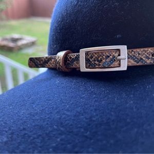 Black hat with snake skin belt